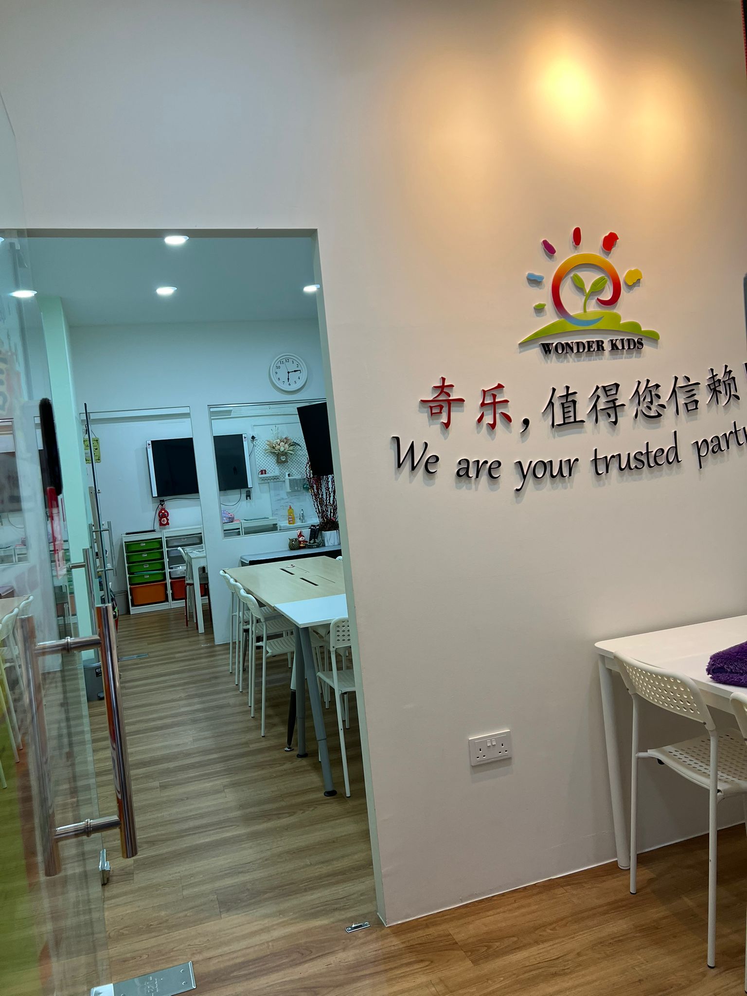 Wonder Kids Learning Centre — classroom with logo mural